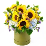 Цветы в коробке Над облаком